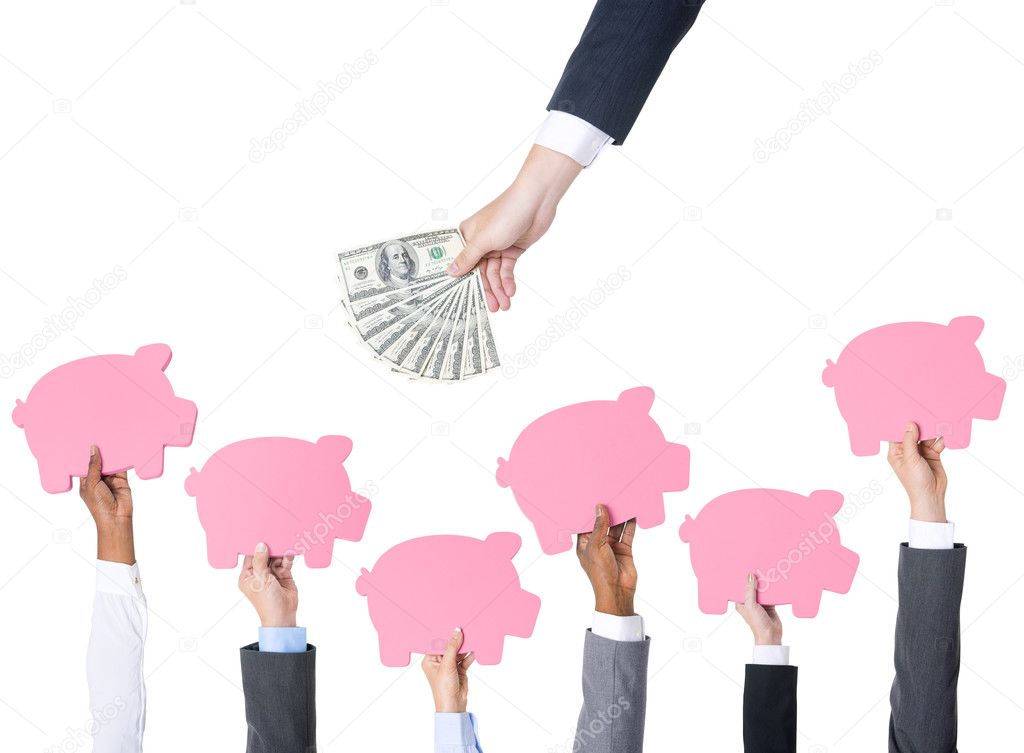 Hands holding Piggy Banks