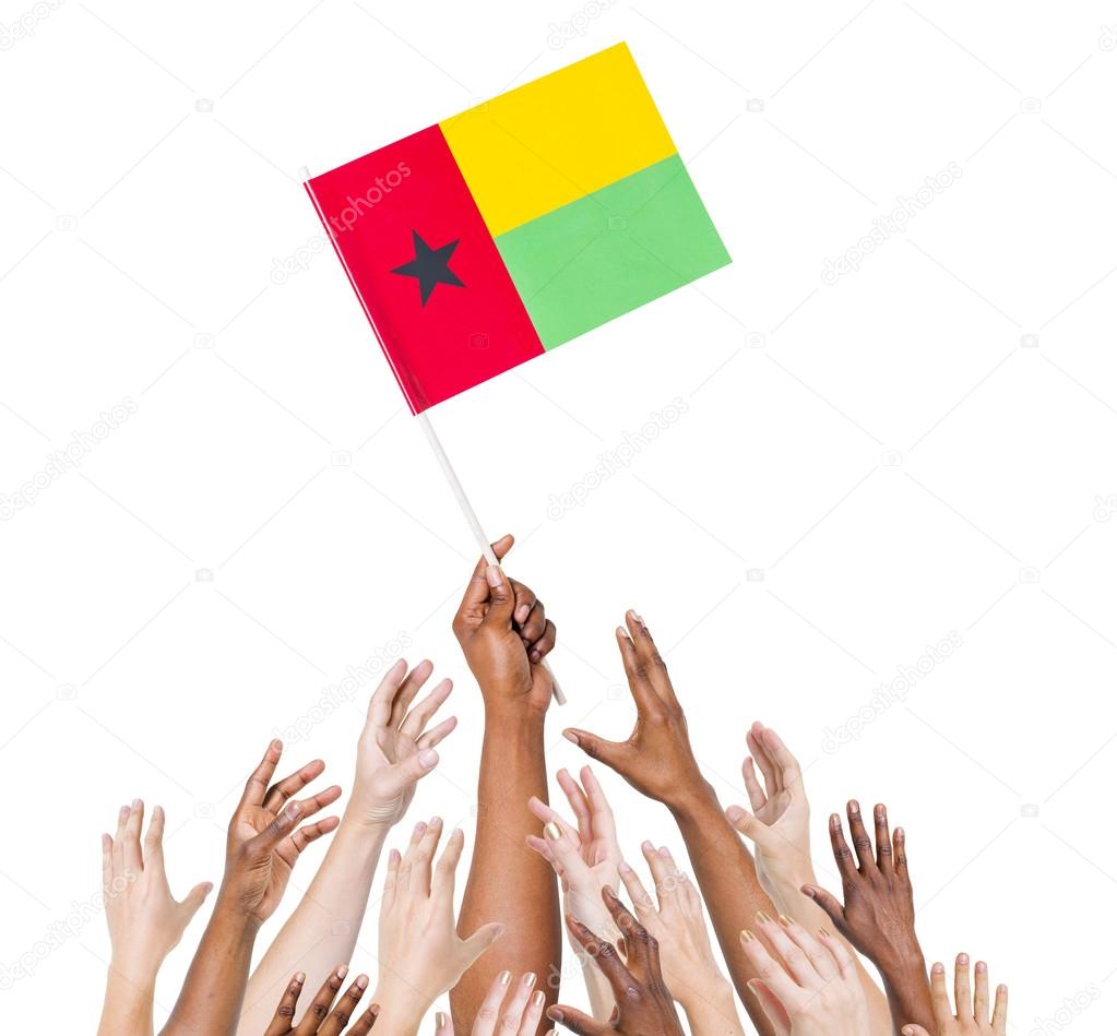 Arms holding flag of Guinea Bissau