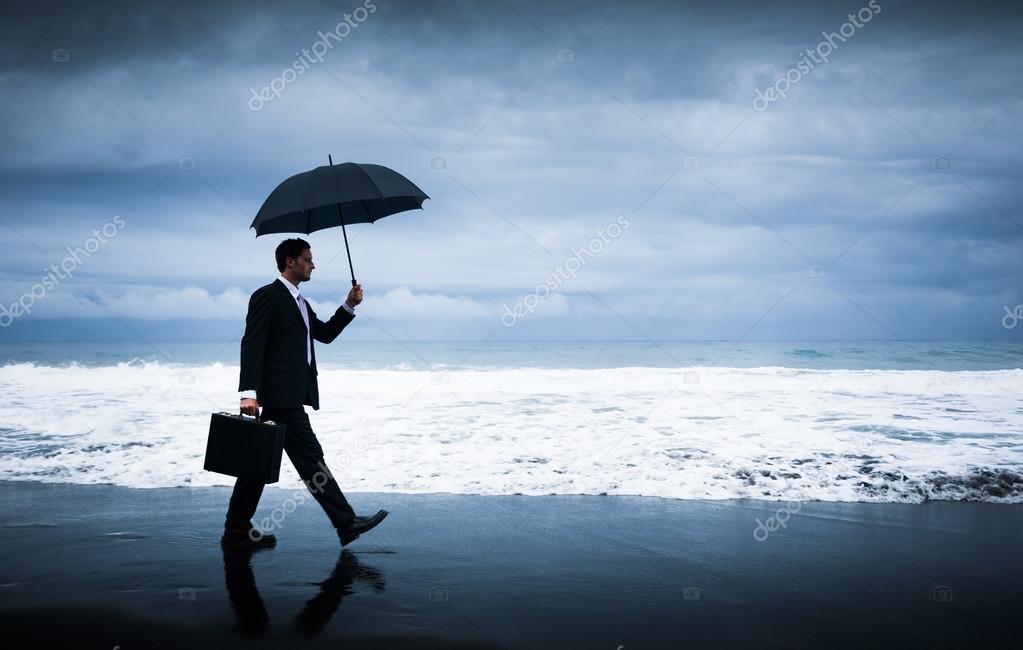 Businessman facing with storm