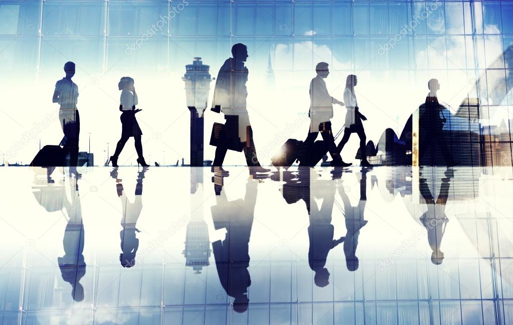 Business Travellers Walking in Airport