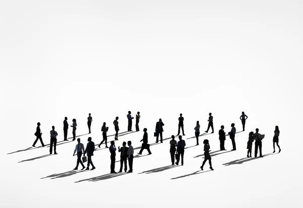 Silhouettes of business people — Stock Photo, Image