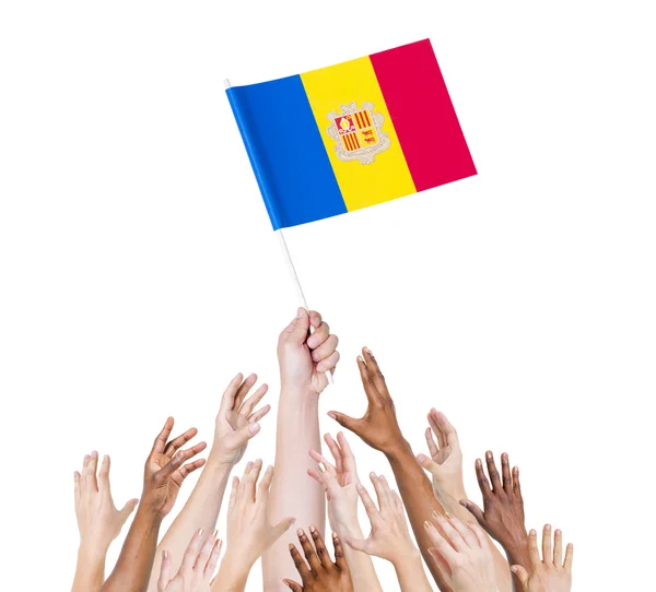 Armen verhoogd voor de vlag van andorra — Stockfoto