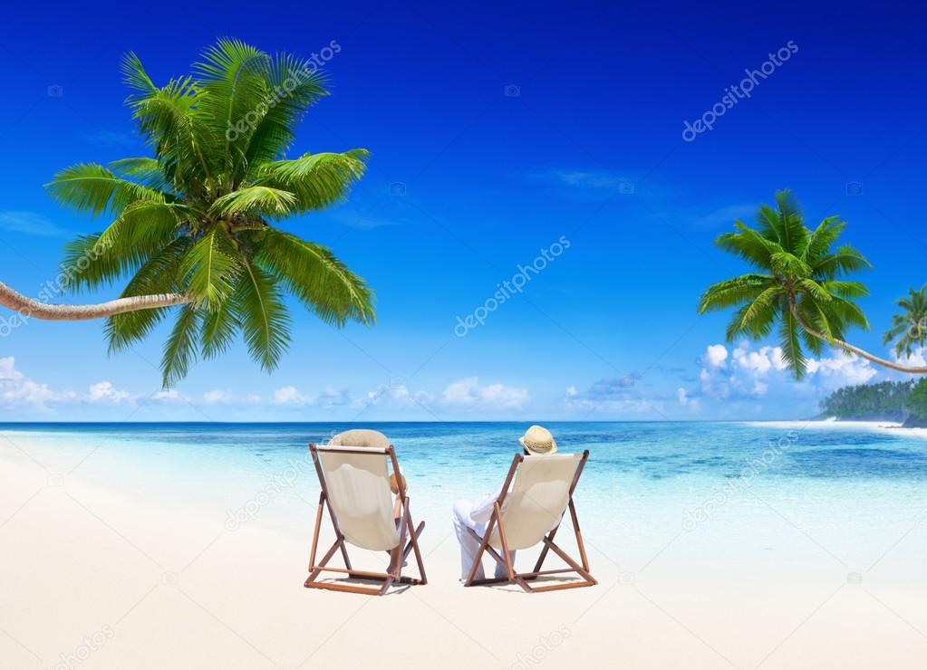 Couple relaxing on beach