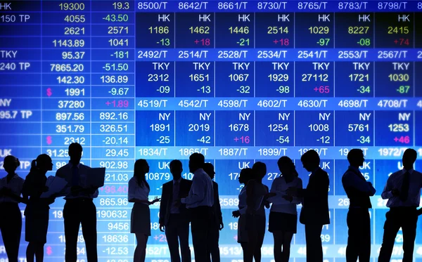 Business people with Stock Exchange Market — Stock Photo, Image