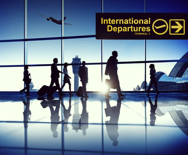 Business people waiting in an airport — Stock Photo, Image