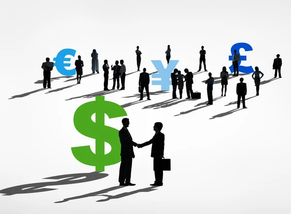 Business people and world currency symbols — Stock Photo, Image