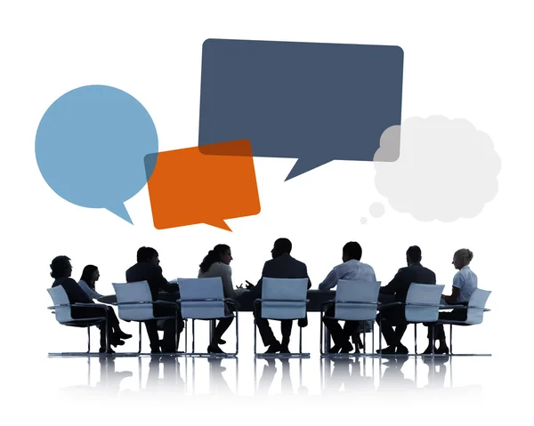 Business People Discussing with Speech Bubbles — Stok Foto