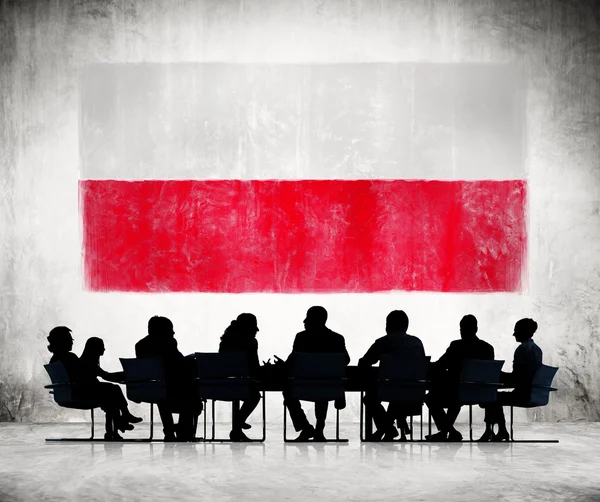 Hommes d'affaires avec drapeau polonais — Photo