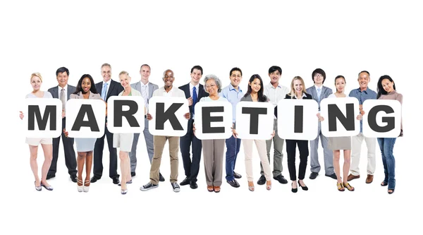 People Holding word Marketing — Stock Photo, Image