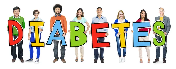 Personas que sostienen el texto Diabetes —  Fotos de Stock