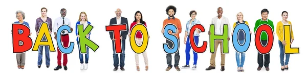 People Holding Letter Back to School — Stock Photo, Image