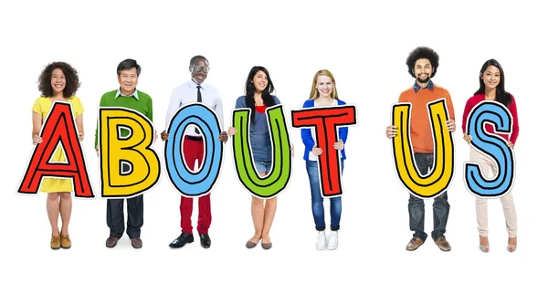 People Holding letters About Us — Stock Photo, Image