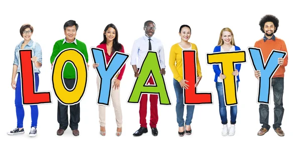 People Holding Loyalty word — Stock Photo, Image