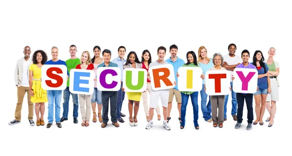 Multi-Ethnic Group Of People Holding Alphabet To Form Security — Stock Photo, Image