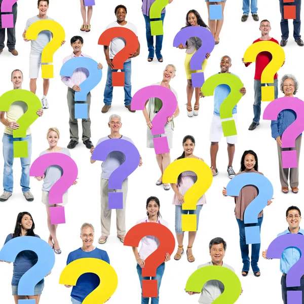 Group of people holding Question mark