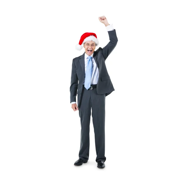 A Cheerful Businessman in a Santa Hat Celebrating — Stock Photo, Image