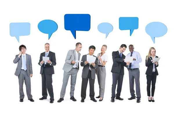 Business People with speech bubbles — Stock Photo, Image