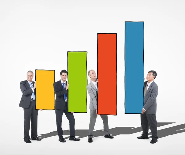 Business People Holding Bar Graph — Stock Photo, Image