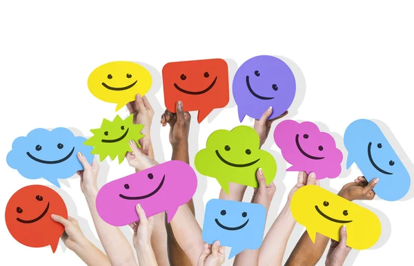 Hands Holding Smiley Faces Icons — Stock Photo, Image