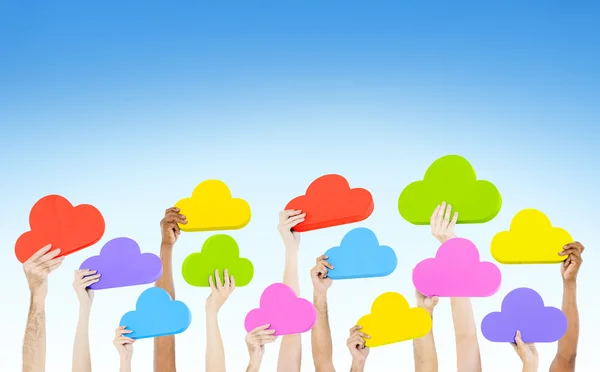 Ruce držící barevné mraky — Stock fotografie