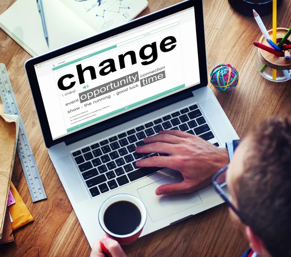 Man Reading the Definition of Change — Stock Photo, Image