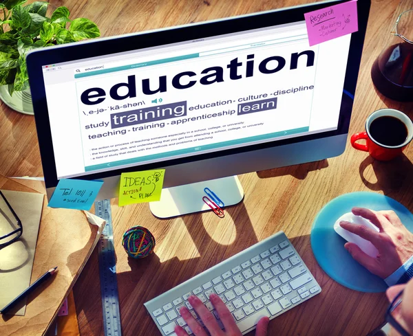 Man Reading the Definition of Education — Stock Photo, Image