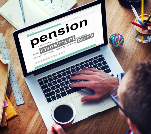 Man reading definition of Pension — Stock Photo, Image