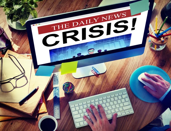 Man sitting at computer with Crisis Concept — Stock Photo, Image