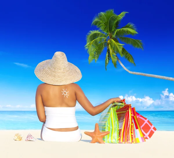 Woman by the Beach with Shopping Bags — Stock Photo, Image