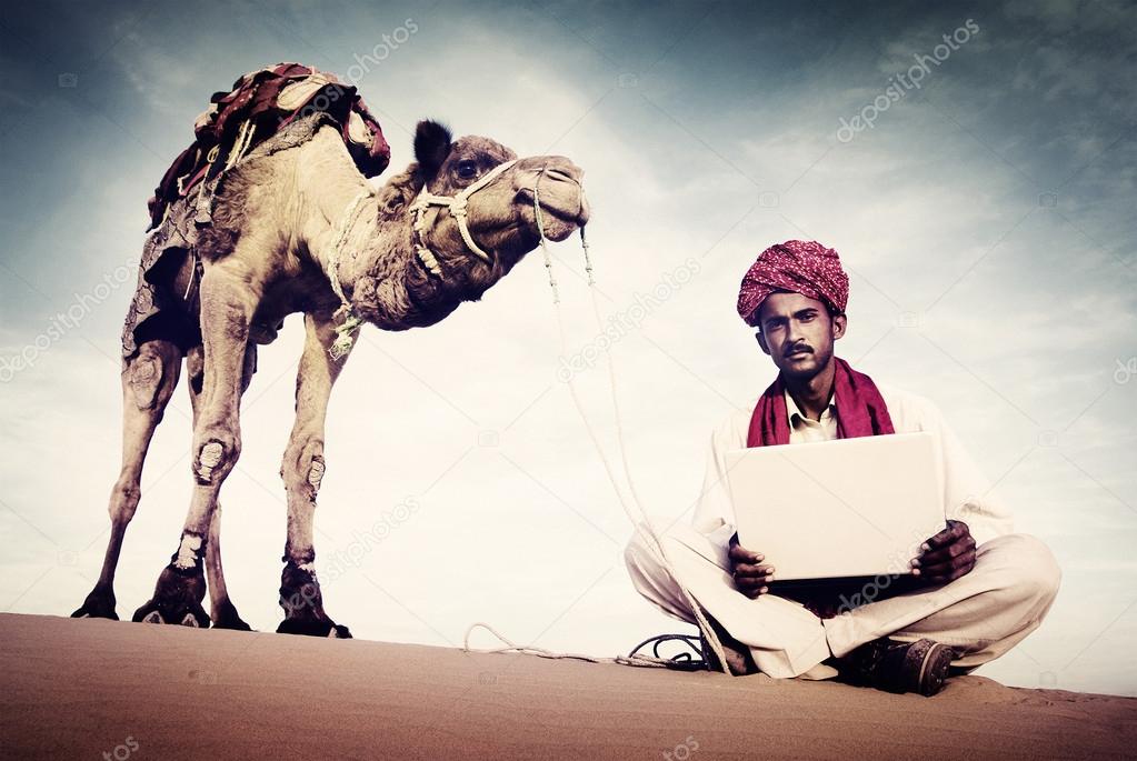 Indian Man Using Laptop