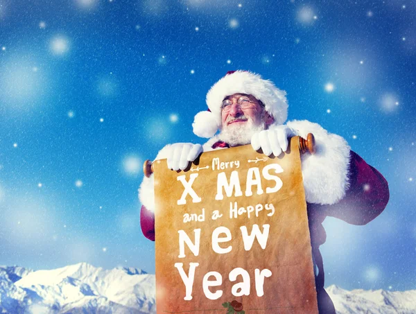 Santa Claus met Nieuwjaar Scroll — Stockfoto