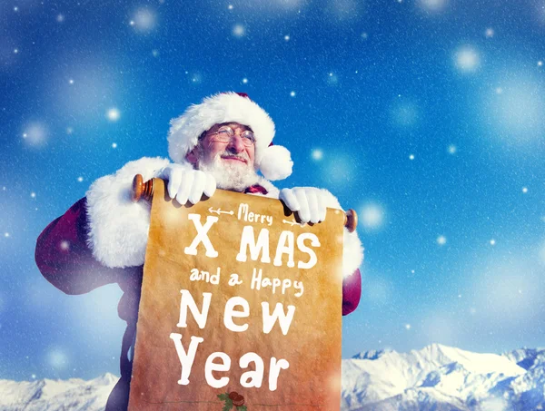 Santa Claus met Nieuwjaar Scroll — Stockfoto