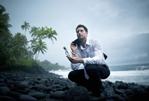 Businessman with Message in Bottle — Stock Photo, Image