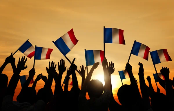 Människor höll sjunker av Frankrike — Stockfoto
