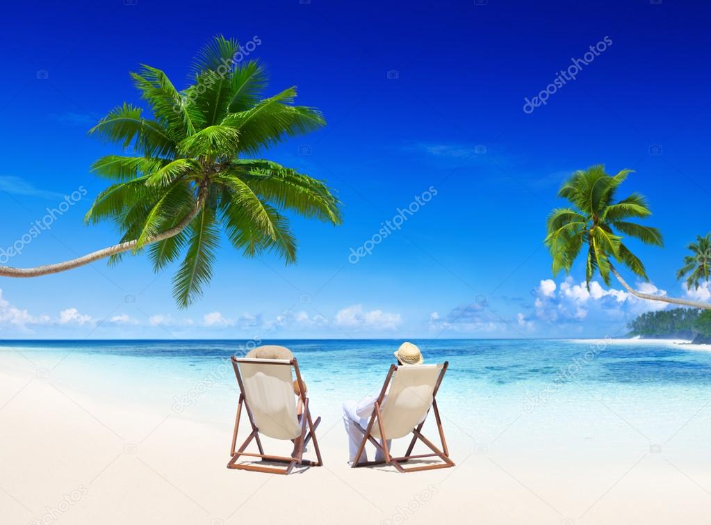 Couple relaxing on beach