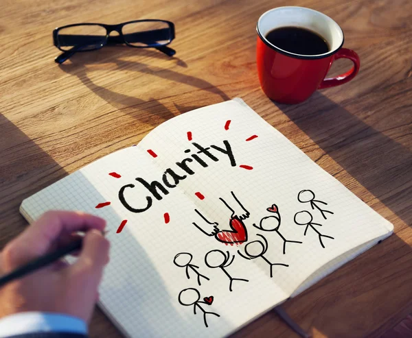 Man Writing Charity Concepts — Stock Photo, Image