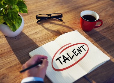 Businessman Writing Word 'Talent'