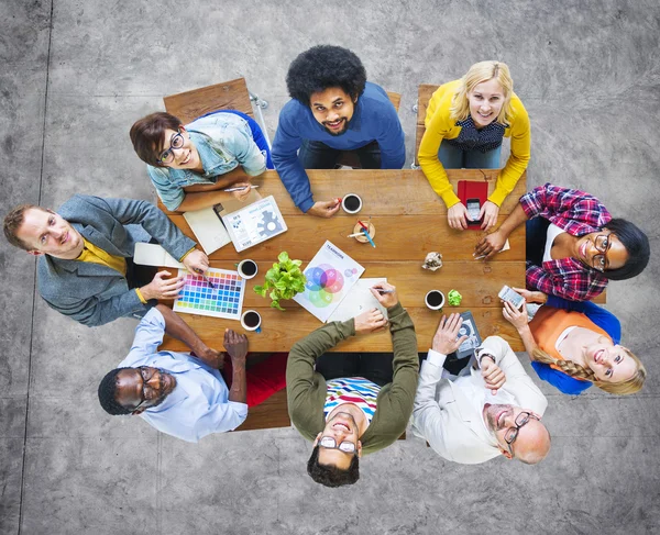 Diseñadores alegres mirando hacia arriba —  Fotos de Stock