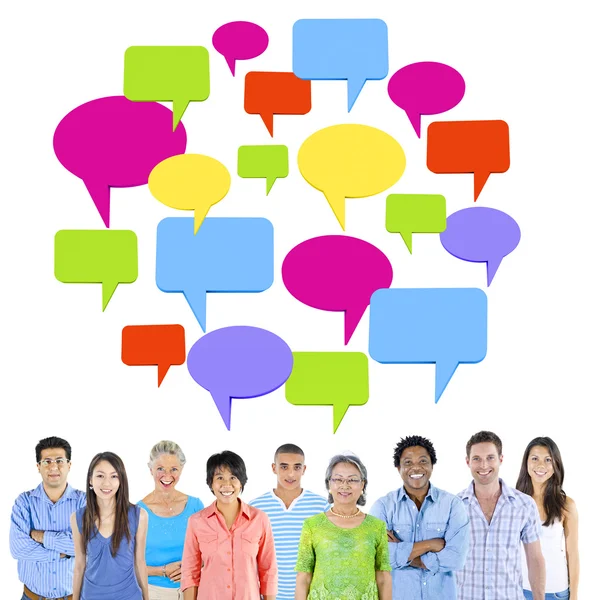 Multi-ethnic group of people with speech bubbles — Stock Photo, Image