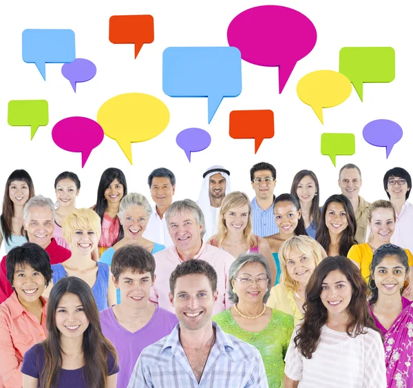 Multi-ethnic group of people with speech bubbles — Stock Photo, Image