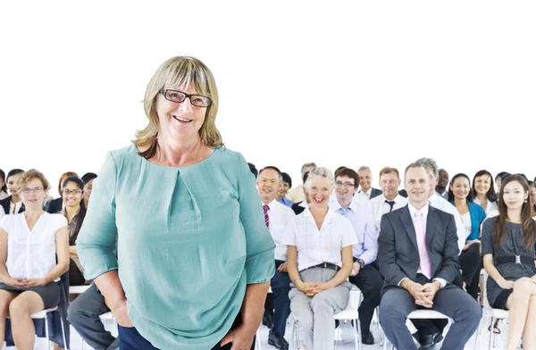Businesswoman in Front of Crowd — Stock Photo, Image