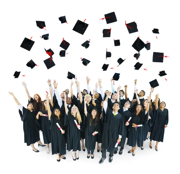 Tappi di laurea gettati in aria — Foto Stock