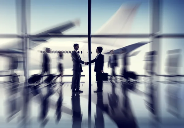Business people by airplane — Stock Photo, Image