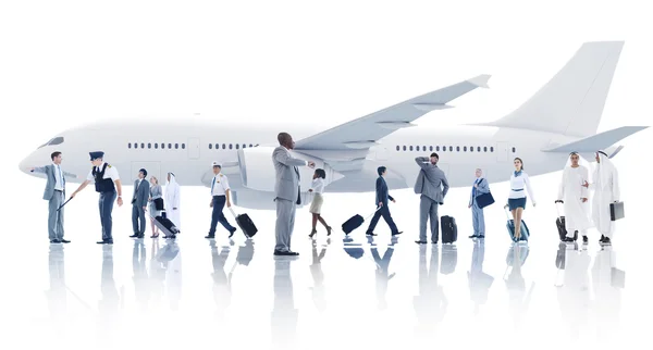 Mensen uit het bedrijfsleven met vliegtuig — Stockfoto