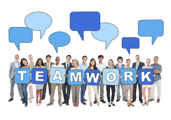Geschäftsleute mit Wort Teamwork — Stockfoto