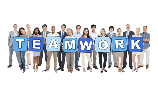 Geschäftsleute mit Wort Teamwork — Stockfoto