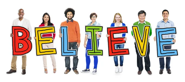 People Holding Letter with Believe — Stock Photo, Image