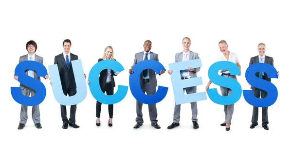 People Holding word 'success' — Stockfoto