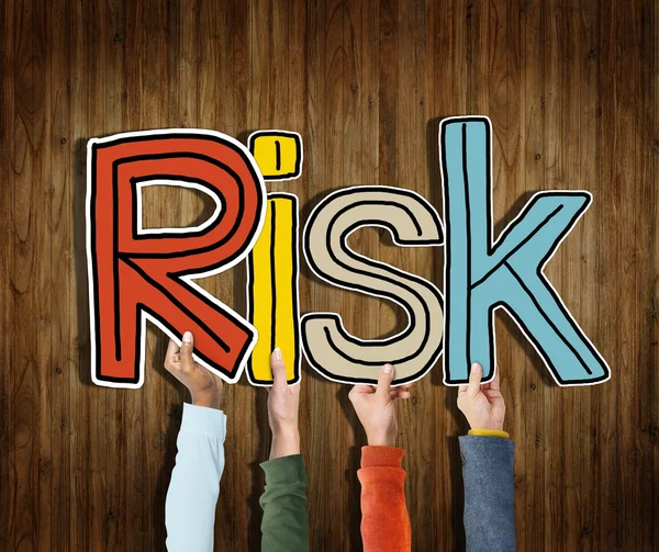 Händer som håller ordet Risk — Stockfoto