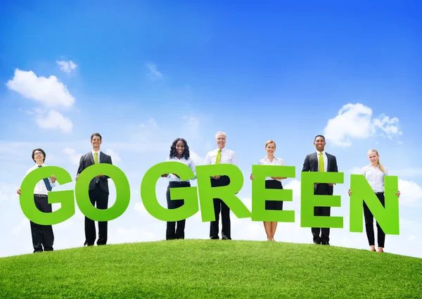 Business People Holding Texts Go Green — Stock Photo, Image